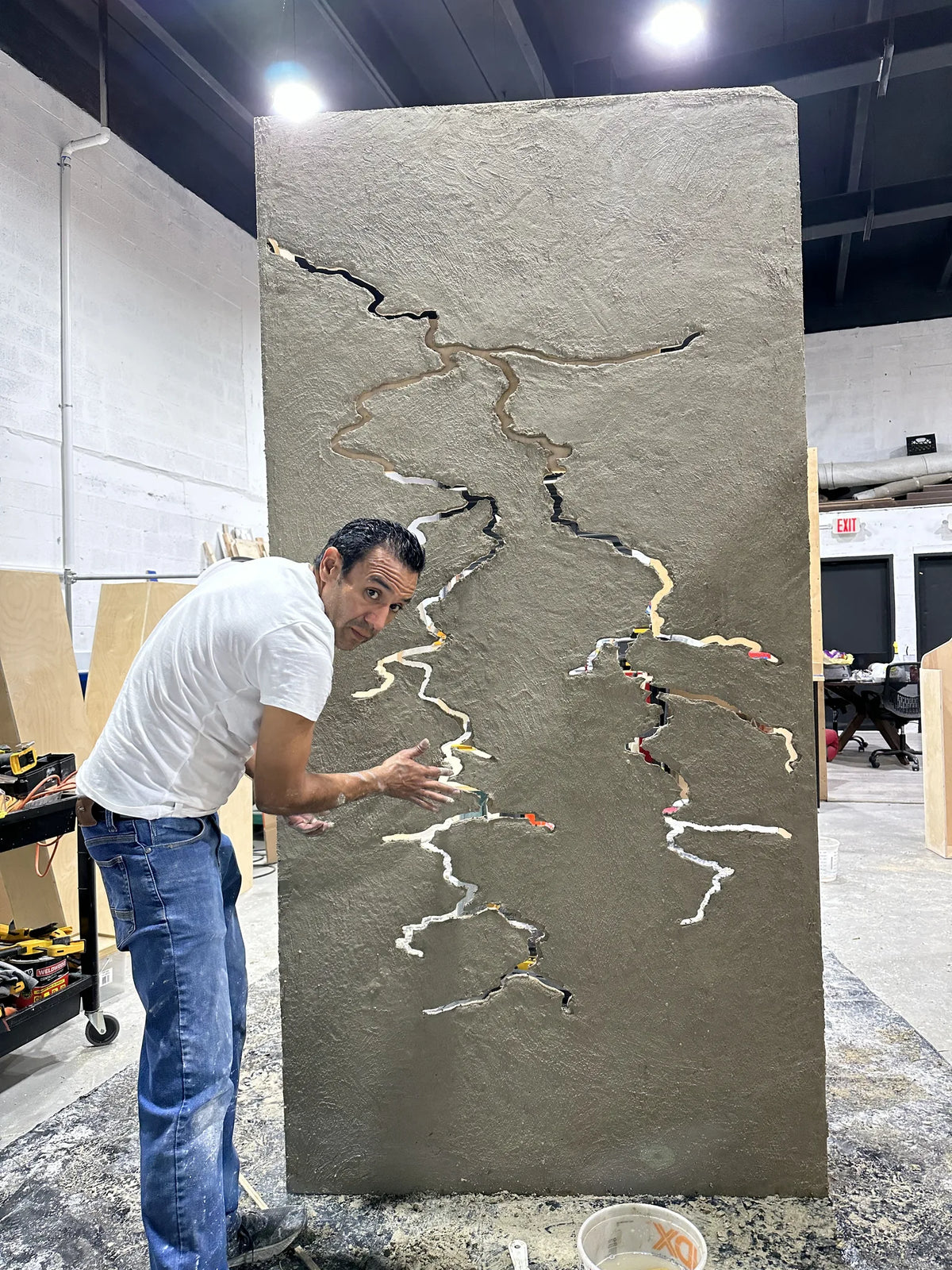 Hand-finished dimensional texture panel in fabrication
