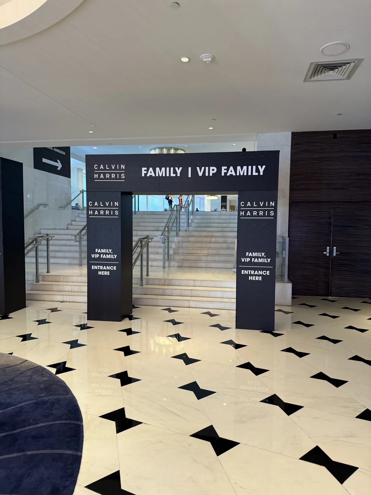 Large-format branded entrance portal for a hospitality event