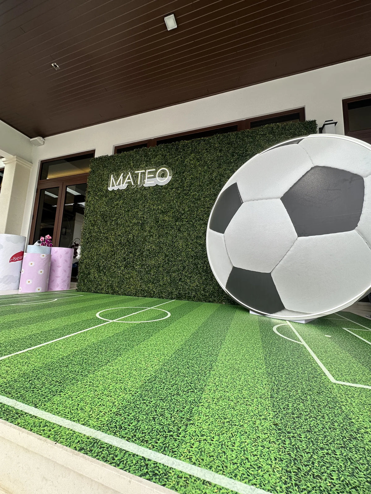 Immersive soccer-themed event activation with dimensional props