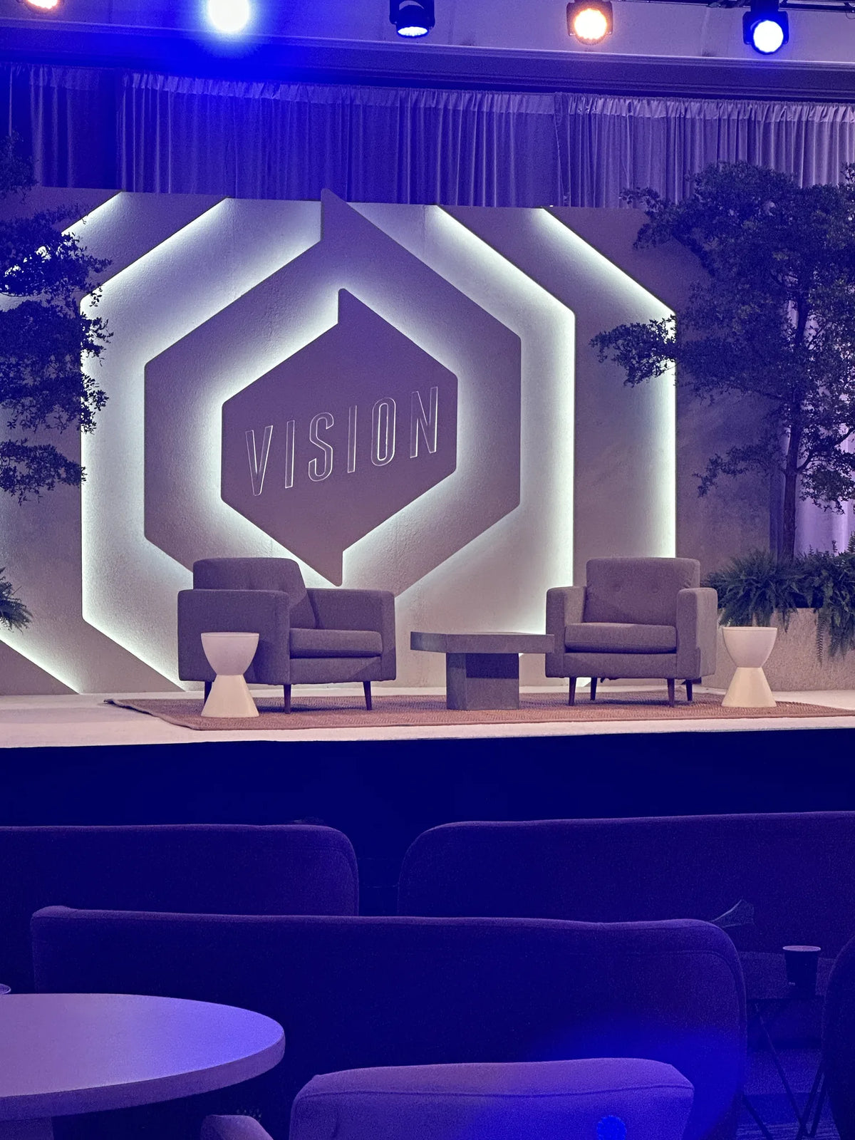 Vision keynote stage with layered dimensional scenery and lighting